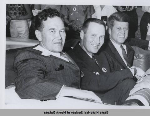 JFK, Governor Guy and Quentin Burdick in a car posing